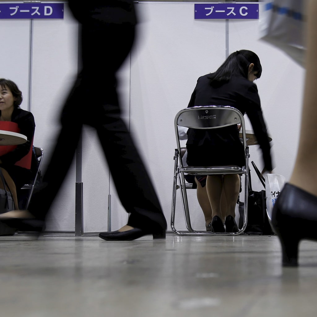 <p>A female job seeker takes part in a job hunting counseling session with advisers during a job fair held for fresh graduates in Tokyo, Japan, March 20, 2016. Picture taken March 20, 2016.  </p>

