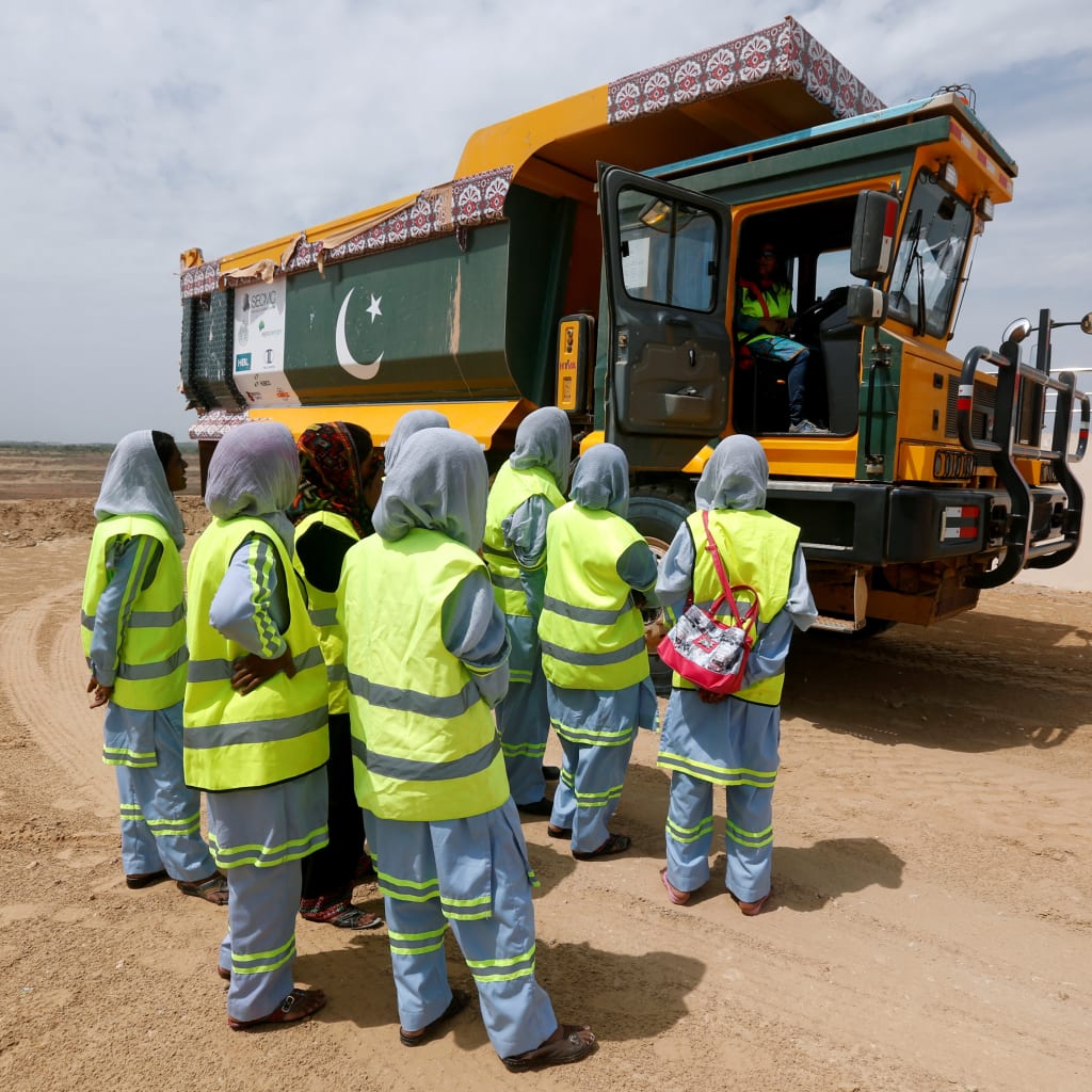 <p>Women trainees during a Female Dump Truck Driver Programme training session held by the Sindh Engro Coal Mining Company (SECMC), in Tharparkar, Pakistan. September 21, 2017. </p>

