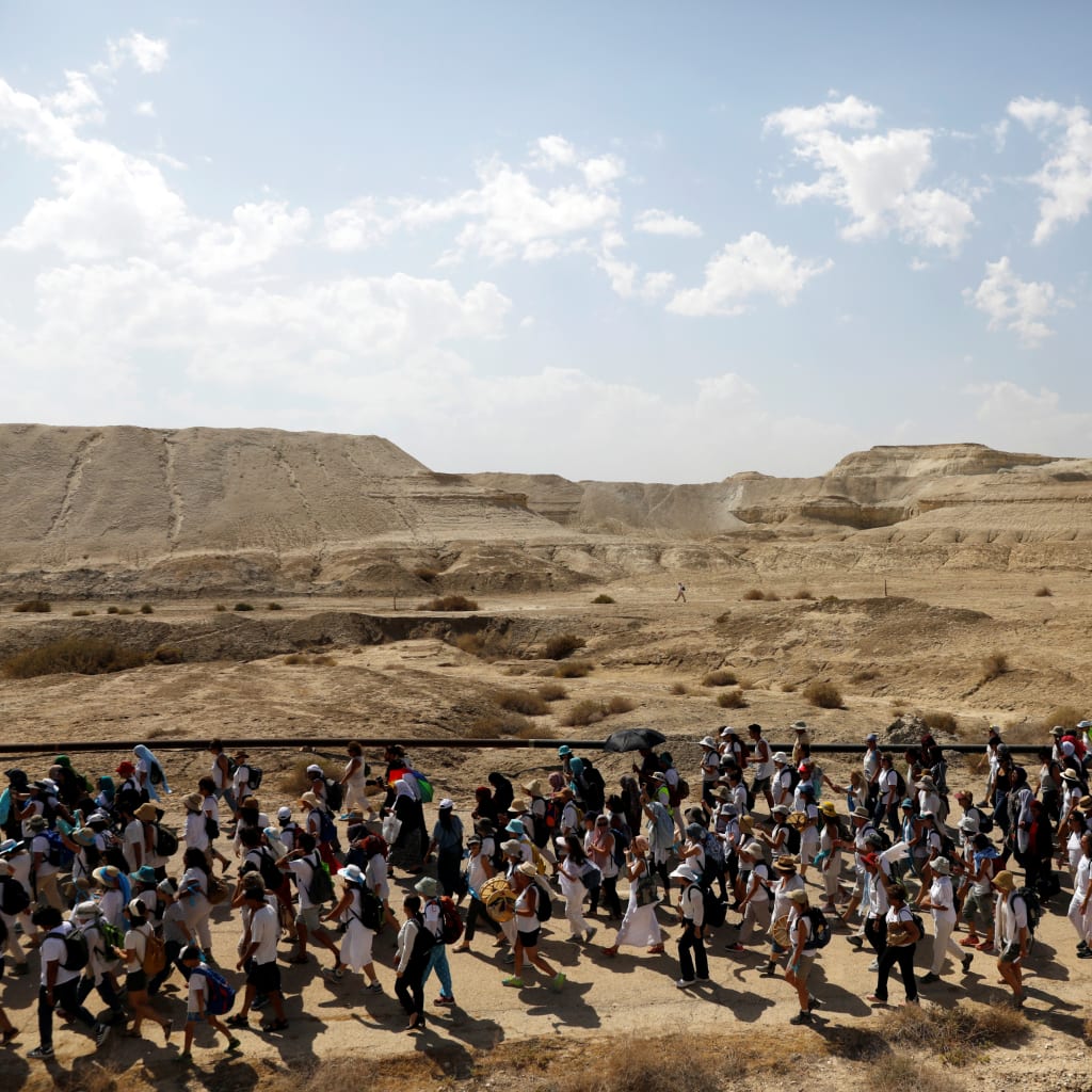 <p>Israeli and Palestinian women march together as part of an event organized by “Women Wage Peace,” group calling for an end to the Israeli-Palestinian conflict, near the Jordan River. October 8, 2017. </p>
