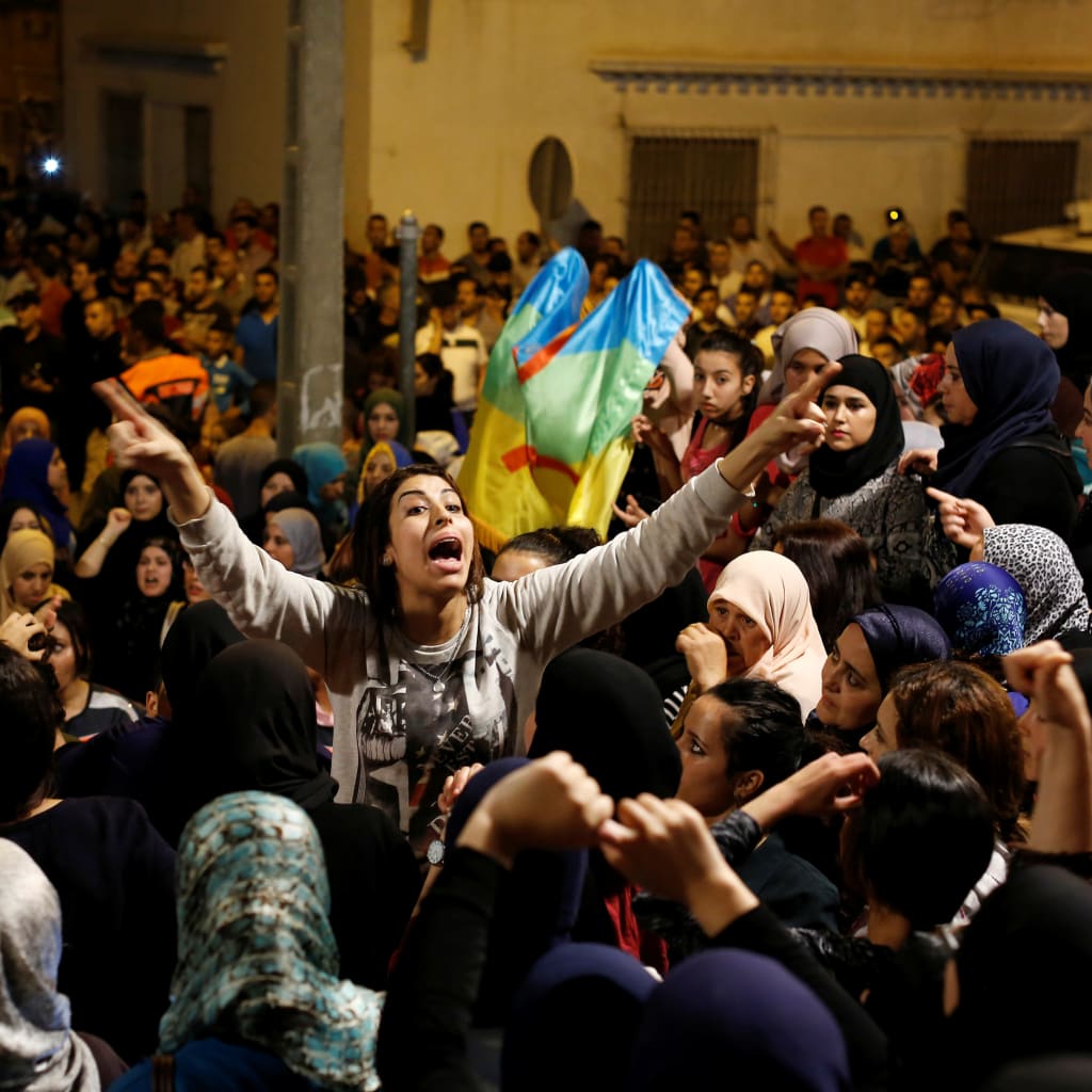 <p>Women shout during a protest against corruption in Morocco June 3, 2017.</p>
