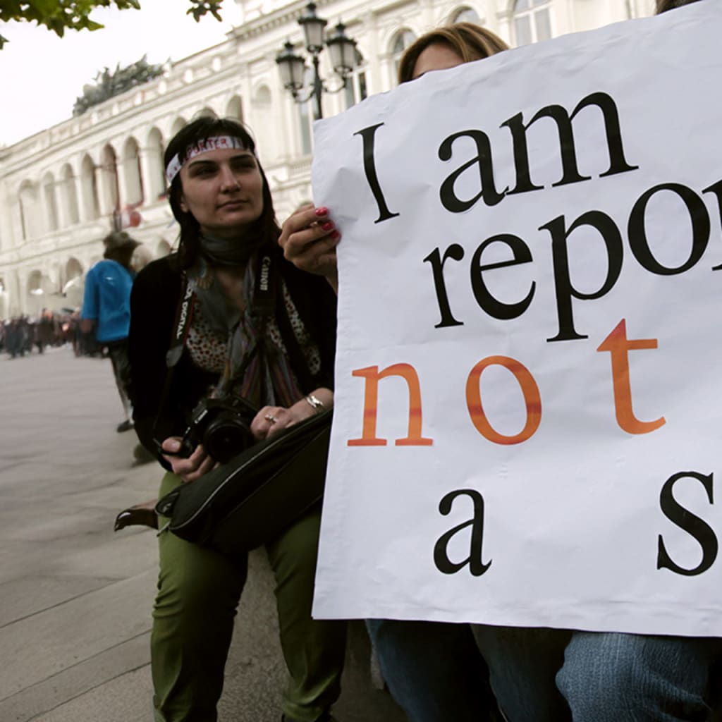 People take part in a flashmob to mark World Press Freedom Day in Tbilisi