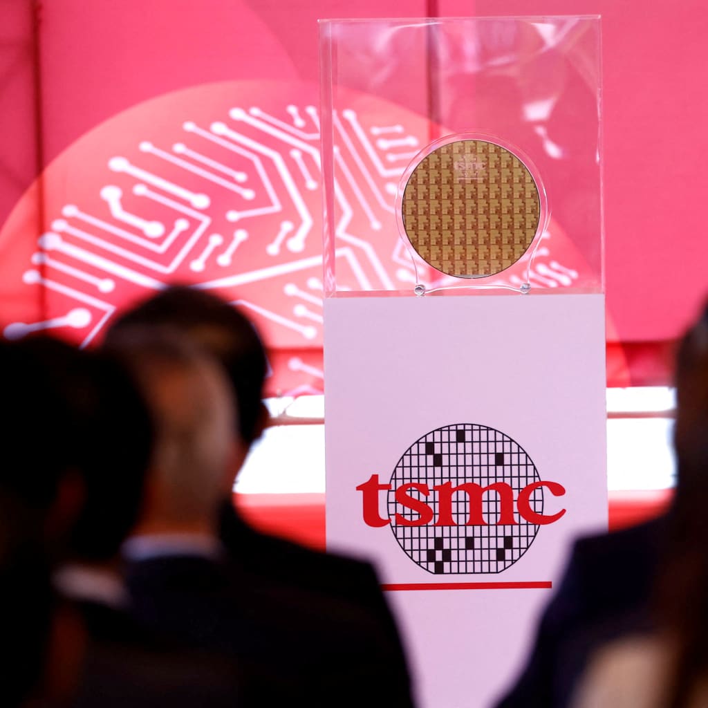 <p>A wafer can be seen as taiwanese chip giant TSMC holds a ceremony to start mass production of its most advanced 3-nanometer chips in the southern city of Tainan, Taiwan December 29, 2022.</p>
