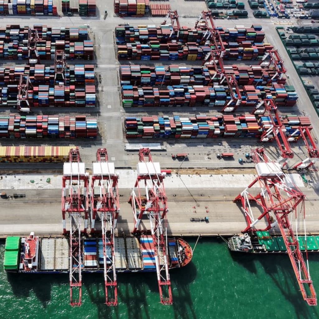 <p>A drone view shows ships and containers at the port in Qingdao, Shandong province, China October 20, 2025.</p>
