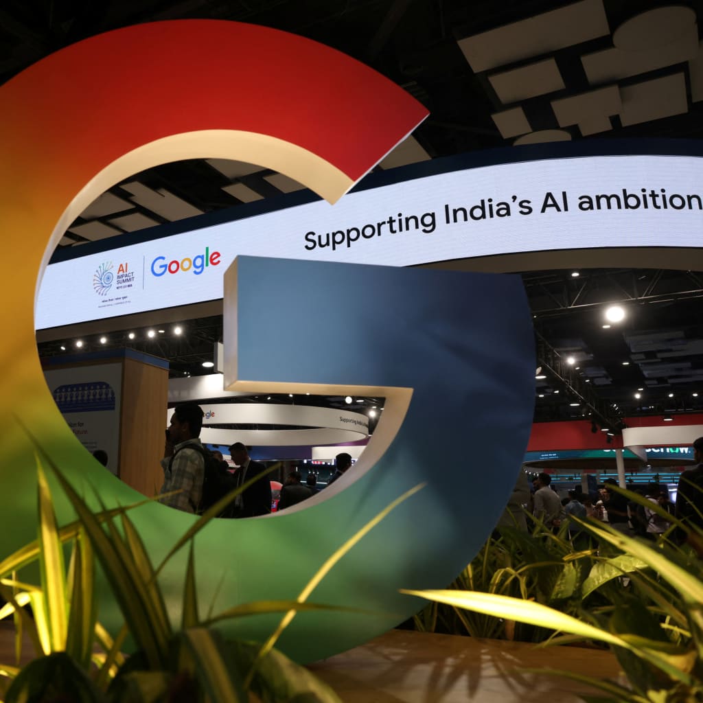 A large colorful sculpture of the Google logo on display at the AI Impact Summit, in New Delhi, India.