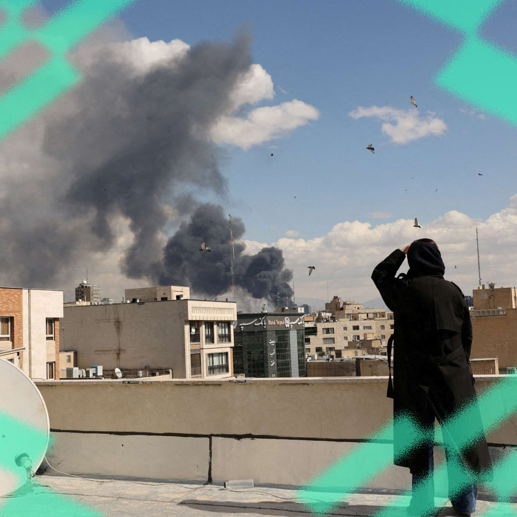 Smoke rises from Israeli and U.S. air strikes on Tehran, Iran, March 1, 2026.