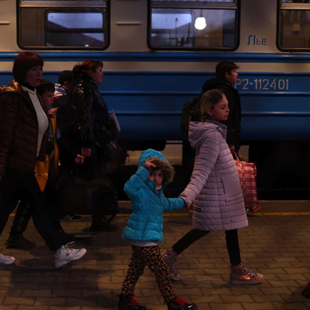 Ukrainian Refugees Fleeing West