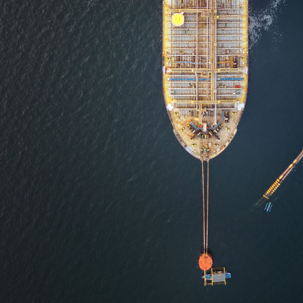 In an aerial view, the Panamanian-flagged Tiger Wings, carrying crude oil from Russia, is moored off the Petron oil refinery on April 1, 2026 in Limay, Bataan province, Philippines.
