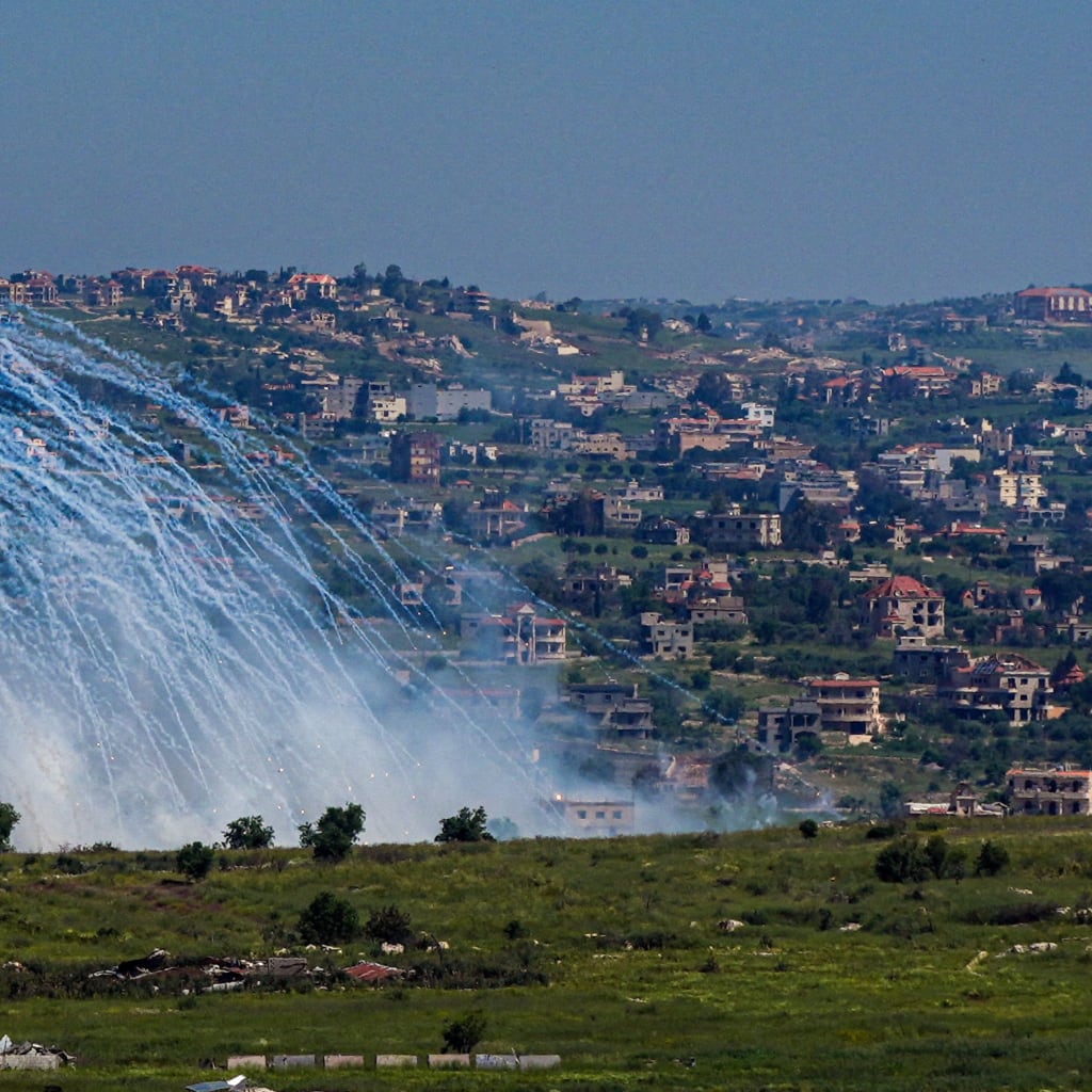 An explosion of what appears to be white phosphorus after an Israeli army attack in South Lebanon, as seen from the Israeli side of the Israel-Lebanon border