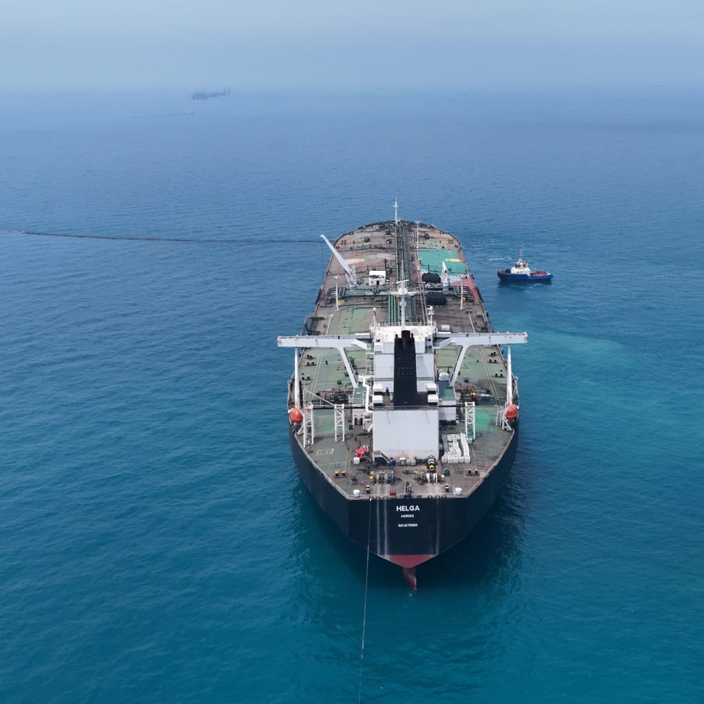 Drone view of oil tanker HELGA berthed at one of Iraq's southern offshore oil terminals near Basra as it prepares to load crude oil, becoming the second vessel to arrive since the closure of the Strait of Hormuz, April 24, 2026.
