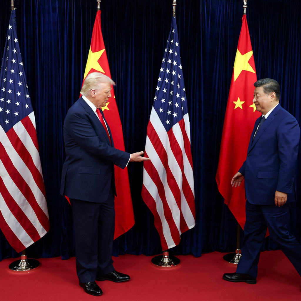 Trump and Xi shake hands on sidelines of APEC 2025 in Busan, South Korea.