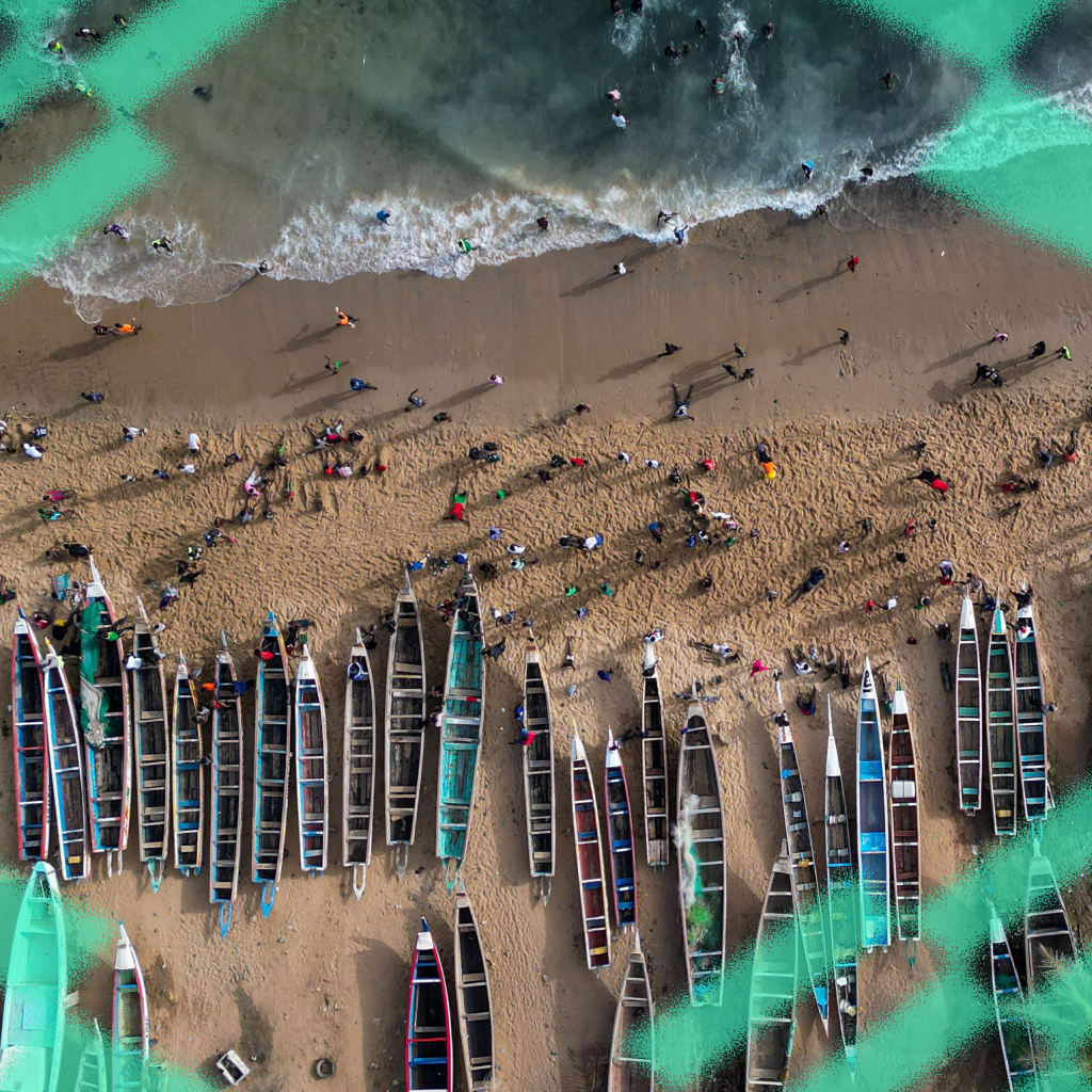 Fishermen's pirogues near the Mosque of the Divinity, in Dakar, Senegal, on May 25, 2025.