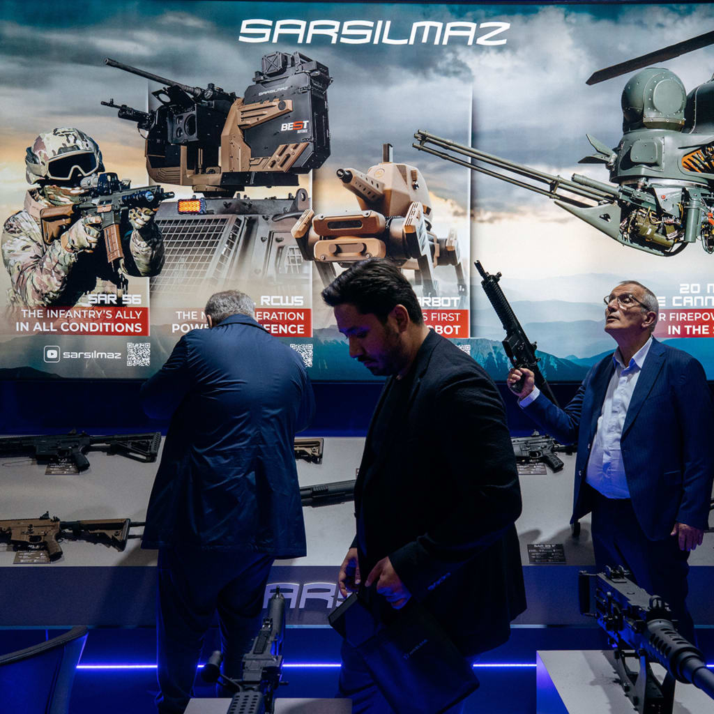 <p>Participants examine equipment on display at the Sarsilmaz exhibition stand during Black Sea Defense, Aerospace And Security (BSDA) exhibition on May 15, 2026 in Bucharest, Romania. The exhibition brings together suppliers and users across land, air, sea, homeland, cyber, and space-defense sectors.</p>
