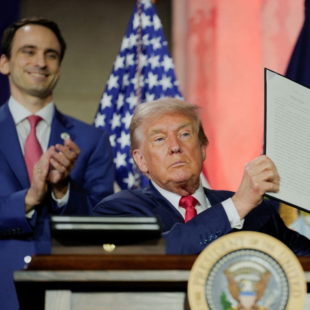 <p>U.S. President Donald Trump holds up a signed executive order related to AI during the “Winning the AI Race” summit in Washington, DC, on July 23, 2025.</p>
