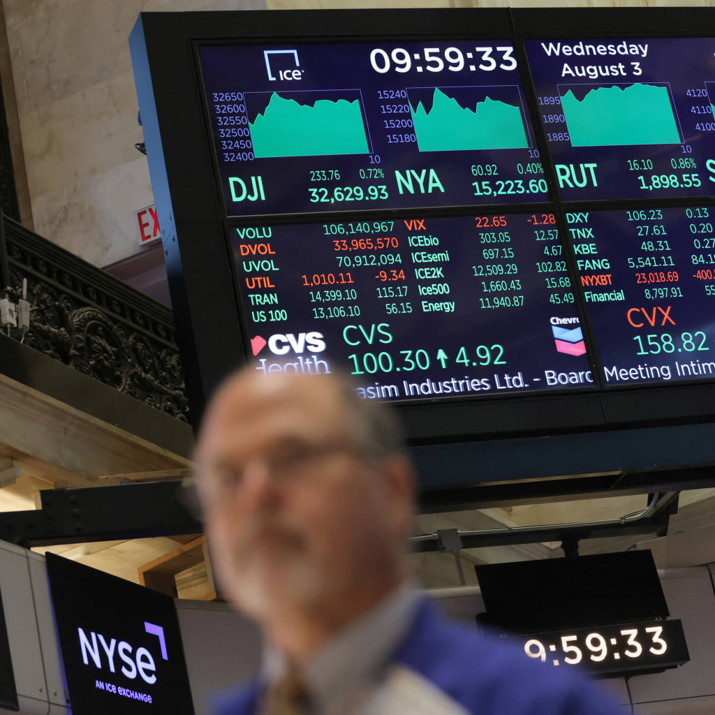 A screen displays market information on the trading floor at the New York Stock Exchange (NYSE) in Manhattan, New York City