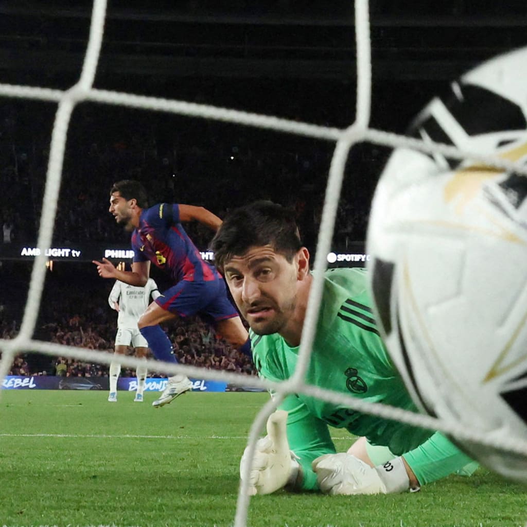 Soccer ball scores in goal.