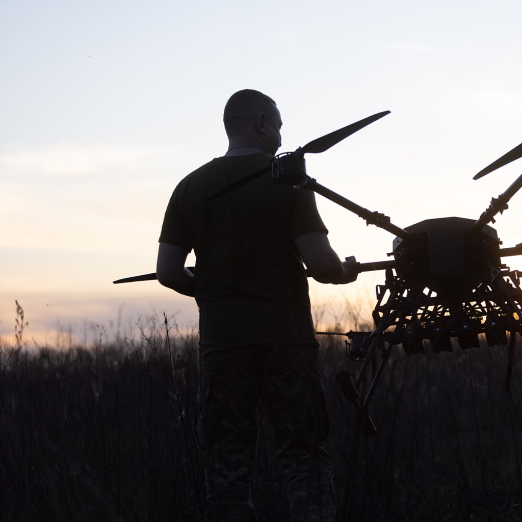 <p>Ukrainian soldiers of the 127th Heavy Mechanized Brigade carry a Heavy Shot UAV across a field on May 8, 2026, in Kharkiv Oblast, Ukraine. </p>