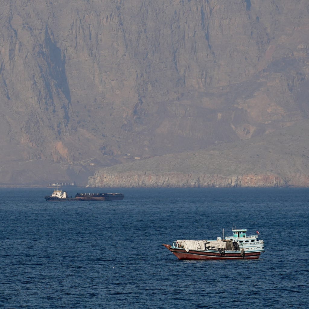 <p>Ships and tankers in the Strait of Hormuz off the coast of Musandam, Oman, April 18, 2026. </p>