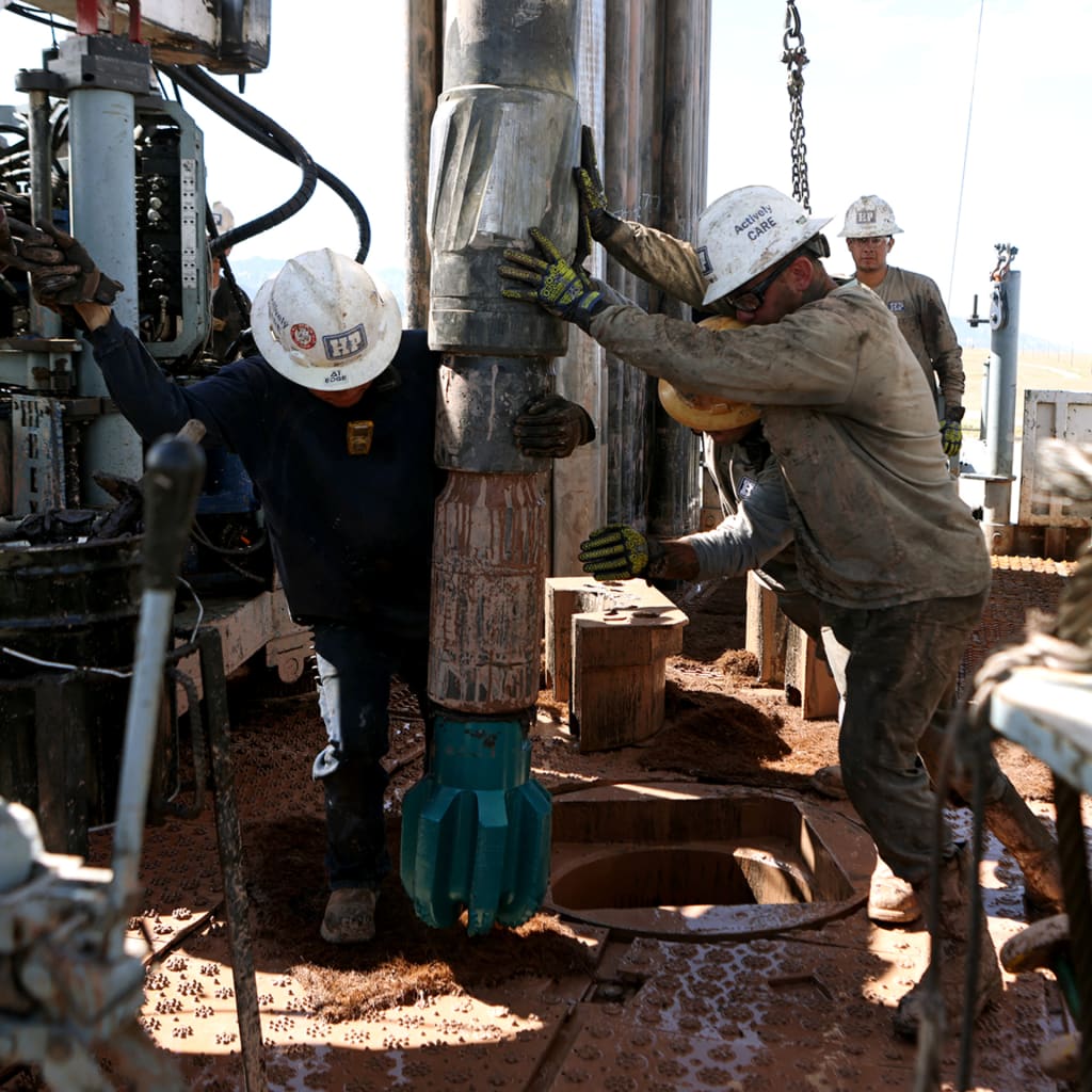 Drillers work on an electric powered drilling platform at the Cape Station geothermal project in Milford, Utah, on June 10, 2025.