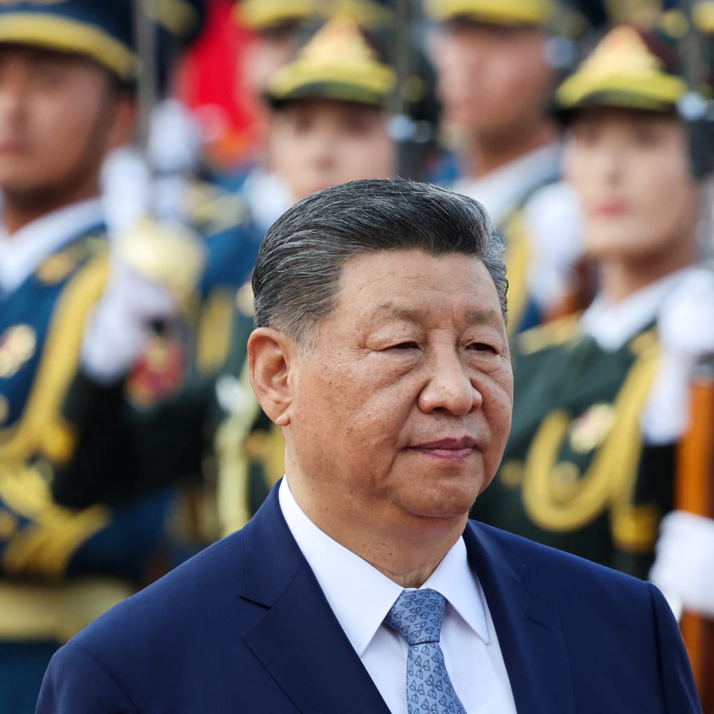 China’s President Xi Jinping attends a welcoming ceremony for Tajikistan's President Emomali Rahmon (not pictured) at the Great Hall of the People in Beijing, China May 12, 2026.