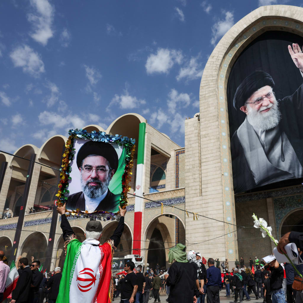 People attend a public farewell ceremony to pay their respects to late Supreme Leader Ayatollah Ali Khamenei, who was killed on February 28 in Israeli and U.S. airstrikes, at the Imam Khomeini Grand Mosalla, in Tehran, Iran July 4, 2026.