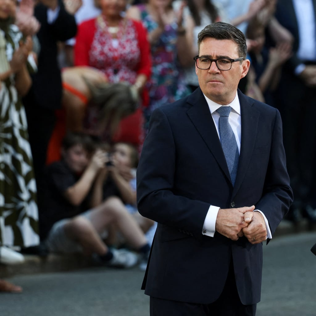 Britain's newly appointed Prime Minister Andy Burnham delivers a speech outside 10 Downing Street after taking office, in London, Britain, July 20, 2026.