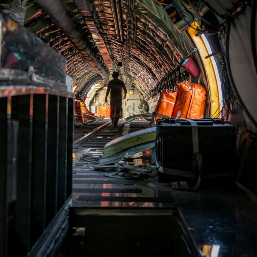 A U.S. Air Force boom operator performs a pre-flight inspection of a KC-135 Stratotanker at a base in the U.S. Central Command area of responsibility on May 27, 2026.