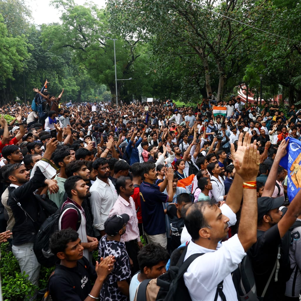 <p>People gather for a protest march on the day supporters of India’s Cockroach Janta Party demonstrate on the opening day of the Indian parliament’s monsoon session, in New Delhi, India, July 20, 2026. </p>
