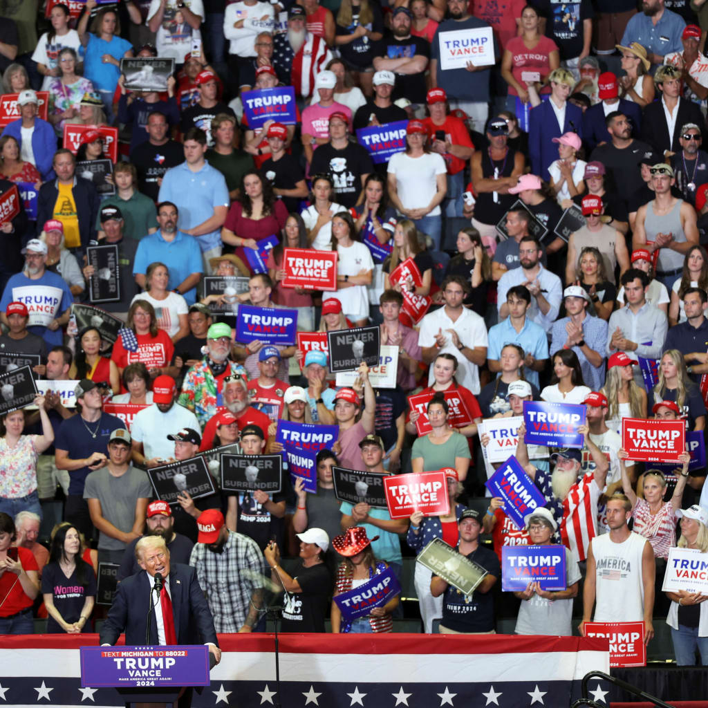 <p>Republican presidential nominee Donald Trump leads a campaign rally in Grand Rapids, Michigan, on July 20, 2024.</p>
