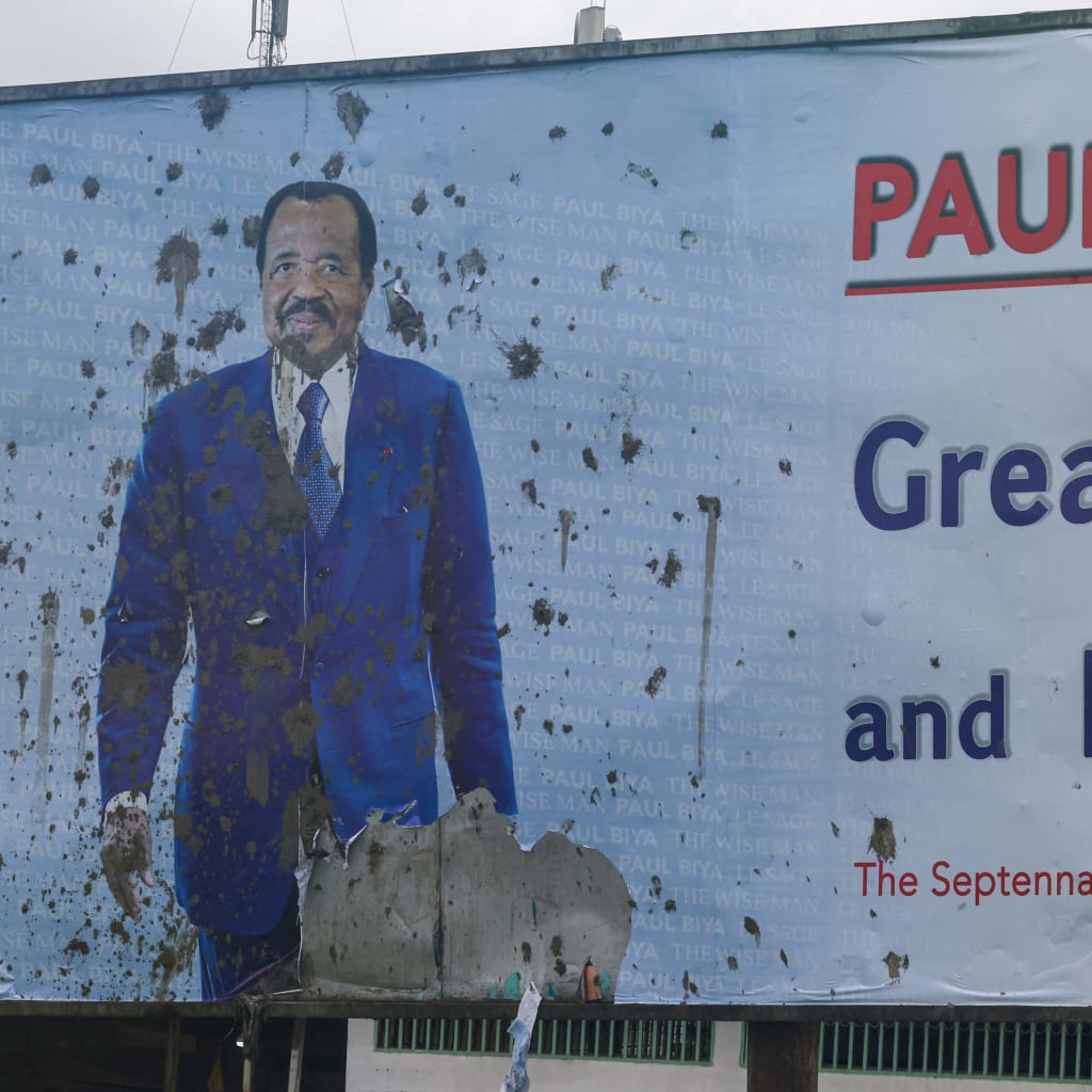 <p>A vandalized campaign billboard of Cameroon’s President Paul Biya after the Constitutional Council declared him as the winner of the October 12 presidential election in Douala, Cameroon on October 27, 2025.</p>
