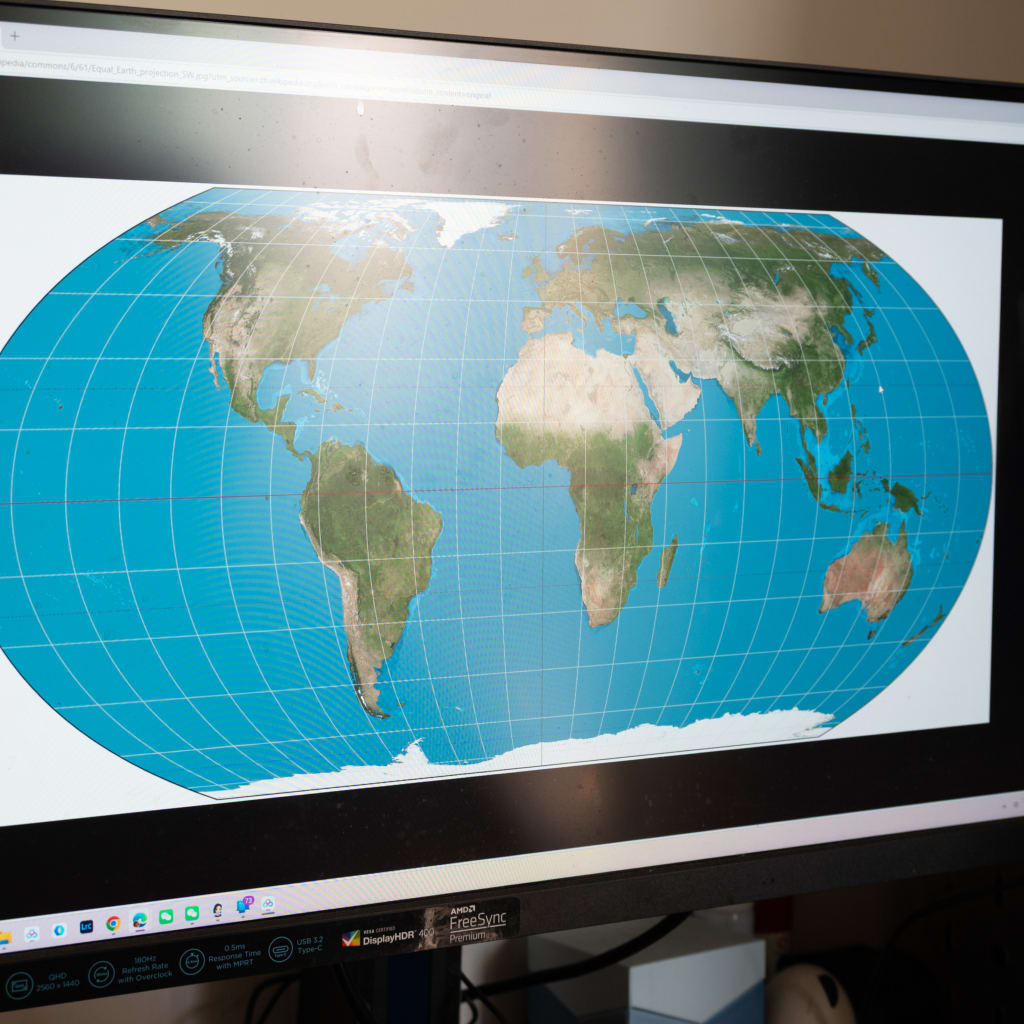 <p>A man checks the “Equal Earth” map projection on a screen in Shanghai, China, on Sunday, September 6, 2026. The United Nations General Assembly recently endorsed the non-binding resolution to promote the projection, which aims to correct geographical distortions caused by the traditional Mercator map.</p>
