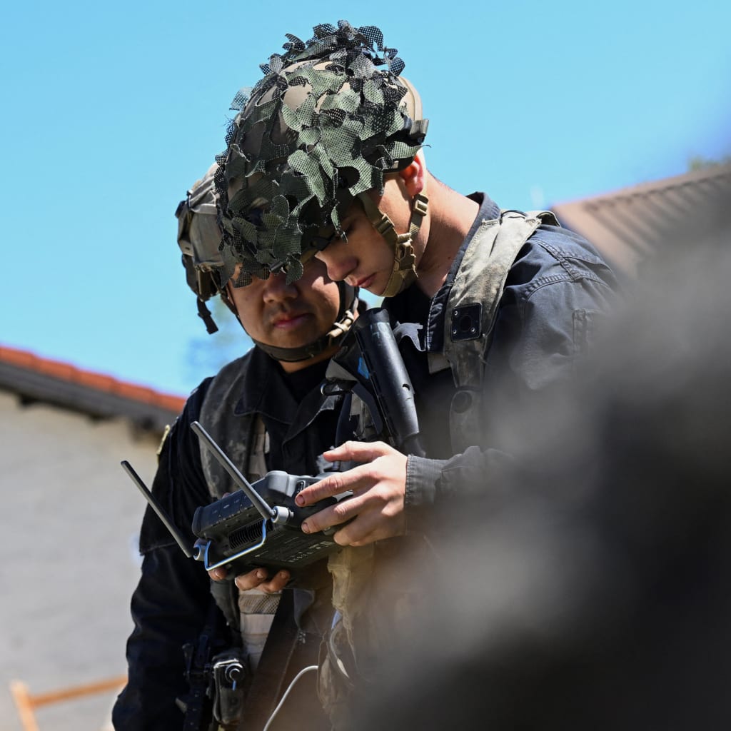 A soldier pilots a drone at a media day during the U.S. Army Combined Resolve exercise at the army's training facilities in Hohenfels, southern Germany, April 30, 2026.
