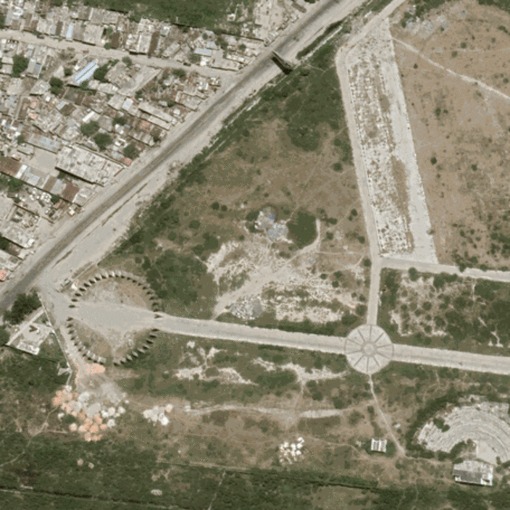 A gif showing a satellite view of the growth of an informal settlement in Port-au-Prince