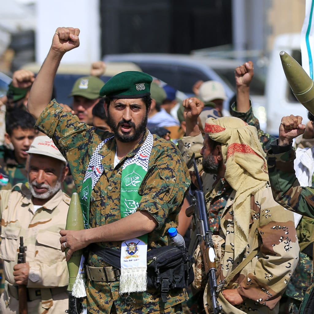 Fighters loyal to the Houthi authorities, shouts slogans during a rally to recruit more fighters, in Sanaa on September 10, 2026.