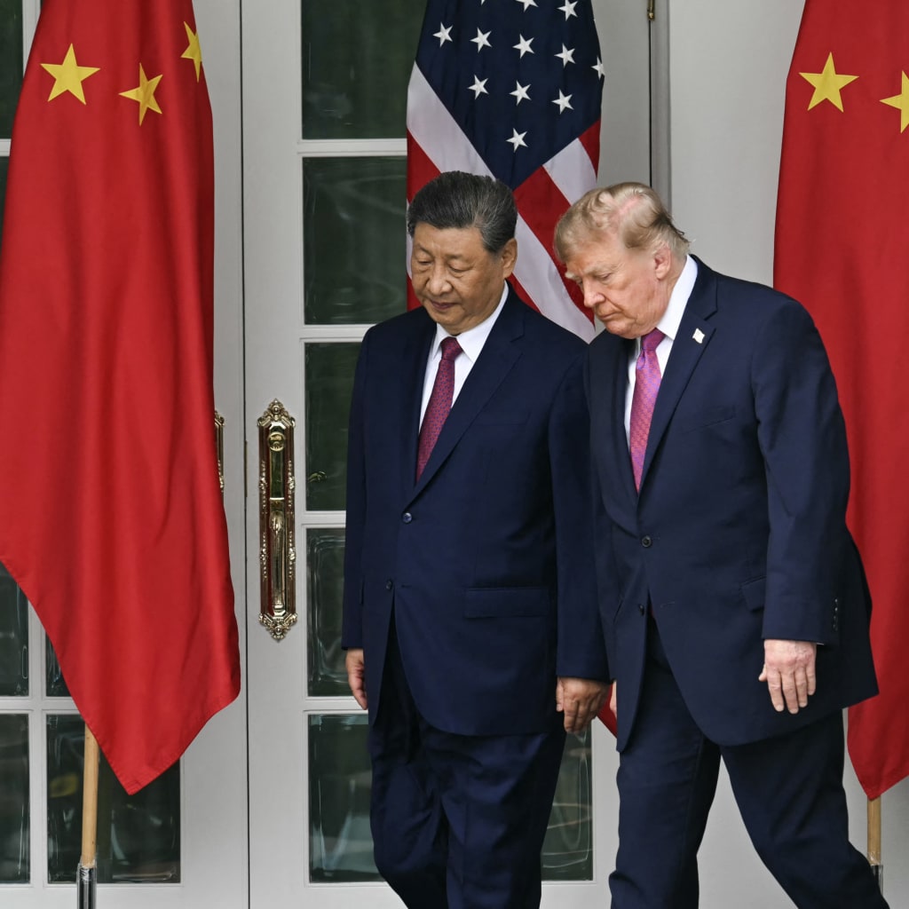 China's President Xi Jinping (L) and U.S. President Donald Trump arrive for a military review in the Rose Garden of the White House in Washington, DC, on September 24, 2026.