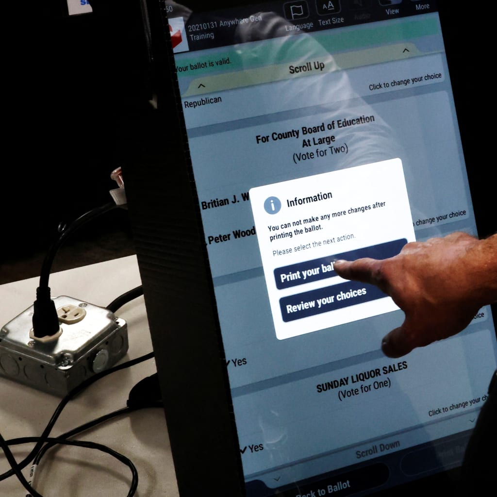 <p>Bartow County Elections Supervisor Joseph Kirk demonstrates how to use a new voting machine ahead of the 2026 midterms in Cartersville, Georgia, September 2, 2026.</p>
