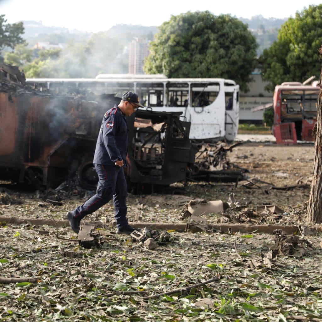2026-01-03T125828Z_238088833_RC2OTIA2ZXQB_RTRMADP_3_USA-VENEZUELA-EXPLOSIONS