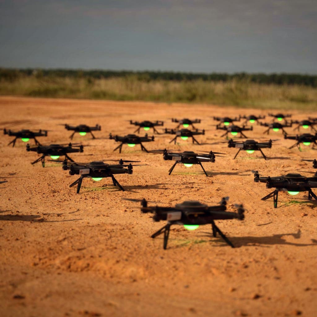 Drones synchronize before a swarm flight during the XVIII Airborne Corps’ Scarlet Dragon 26-3 at Fort Bragg, N.C., on Sept. 16, 2026.