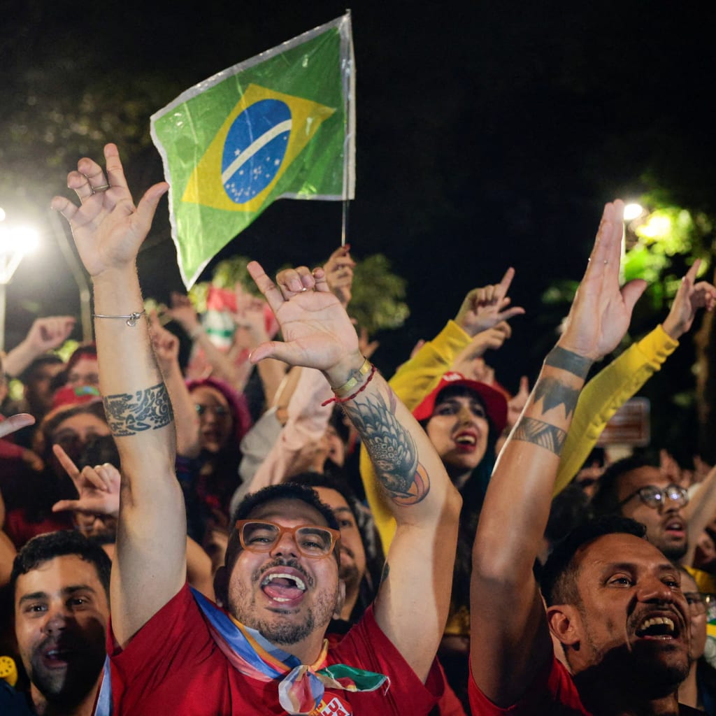 <p>Supporters gather to watch Brazil’s President Luiz Inacio Lula da Silva, the Workers’ Party (PT) candidate for re-election, speak after his victory in the presidential runoff election, at Paulista Avenue, in Sao Paulo, Brazil, October 25, 2026.</p>
