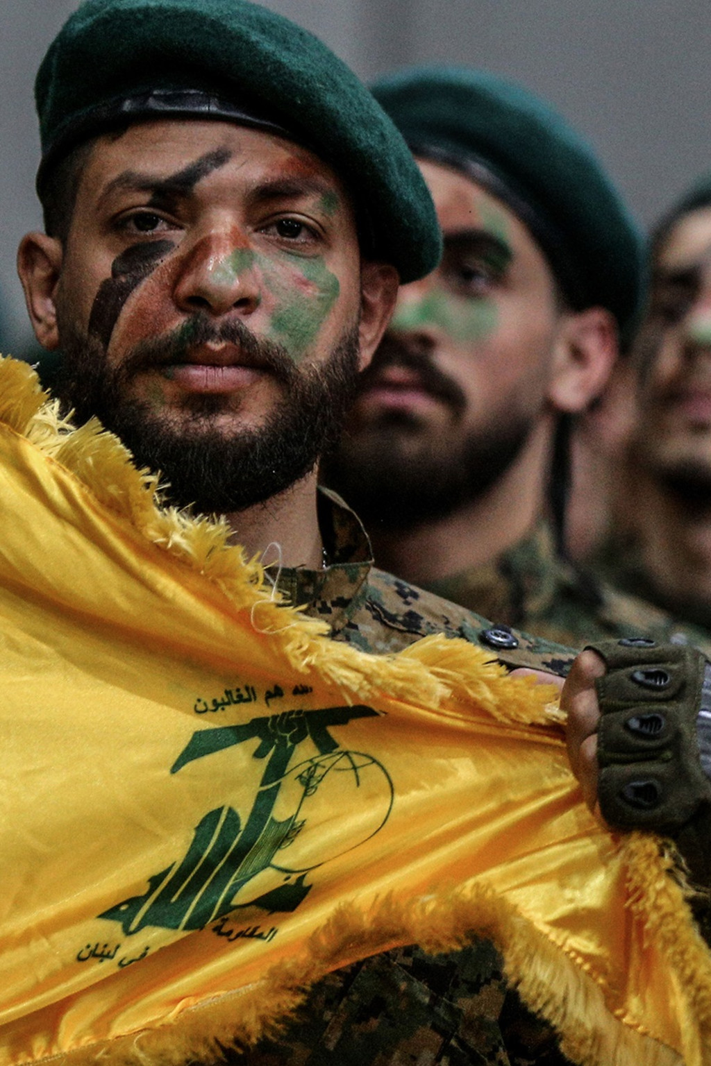 <p> Hezbollah militants parade through Beirut’s southern suburb.</p>
