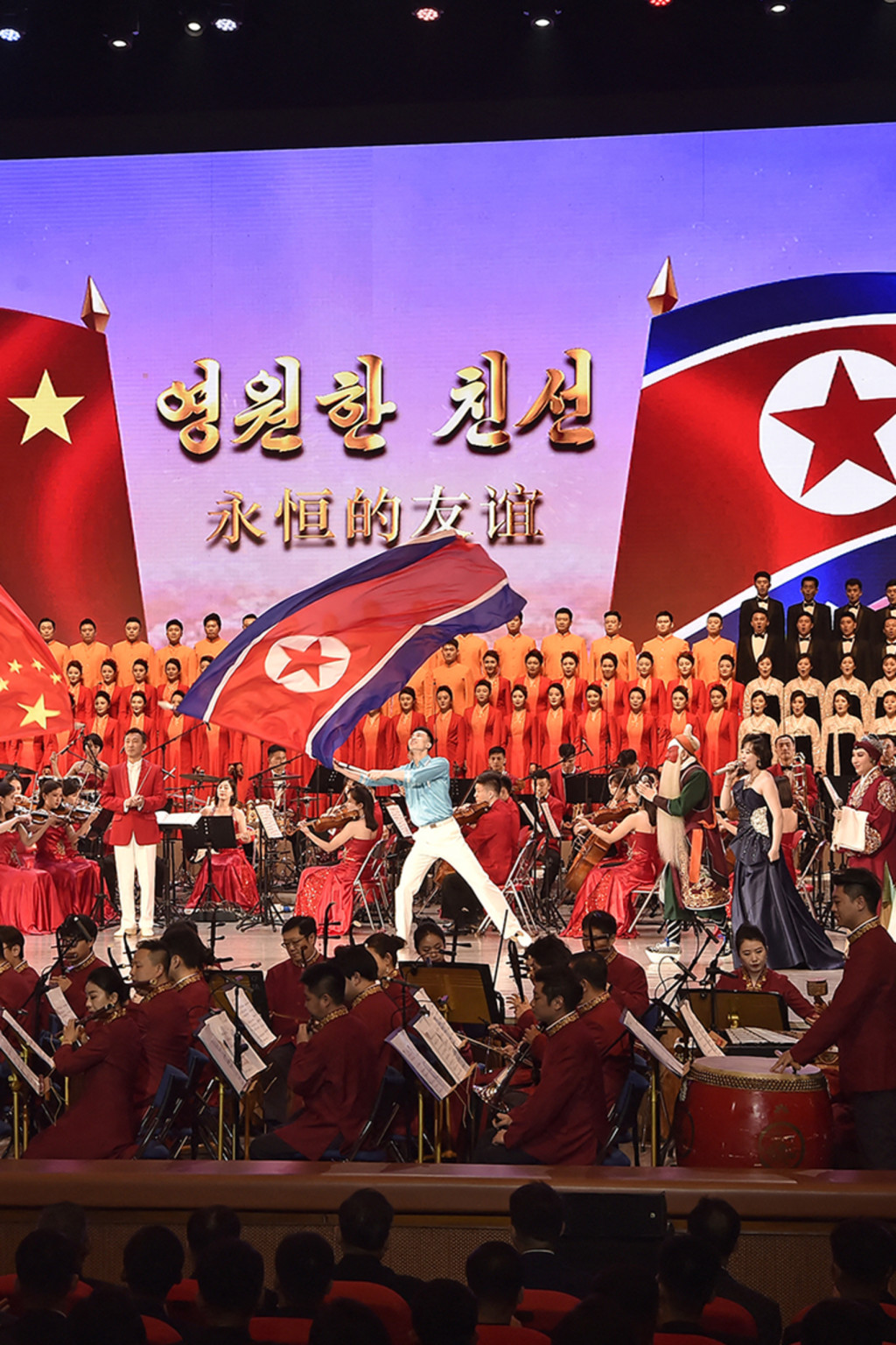 <p>Artists perform in the “North Korea-China Friendship Year” ceremony at a theater in Pyongyang.</p>
