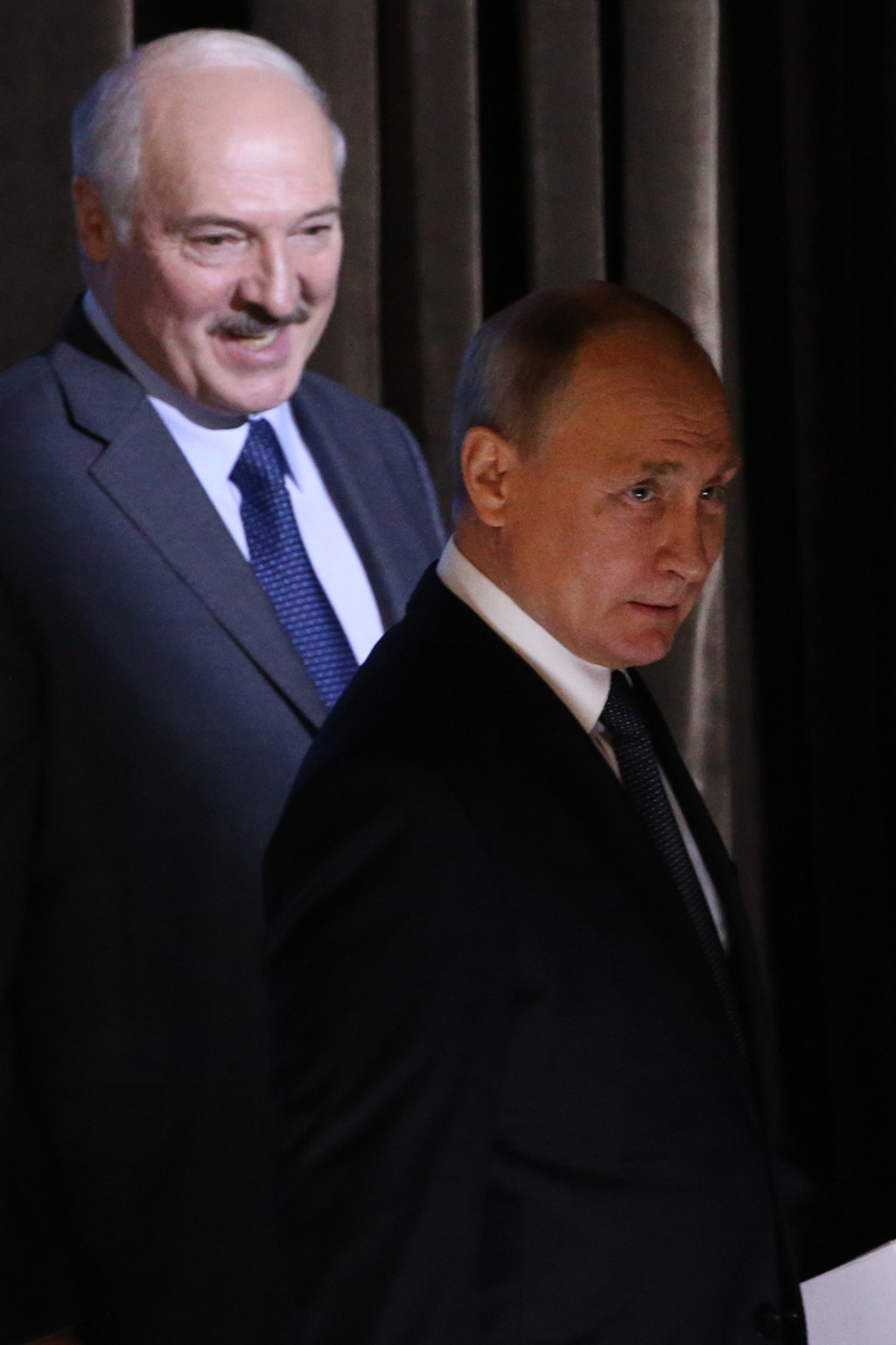 <p>Presidents Alexandr Lukashenko and Vladimir Putin attend a regional forum in 2018.</p>
