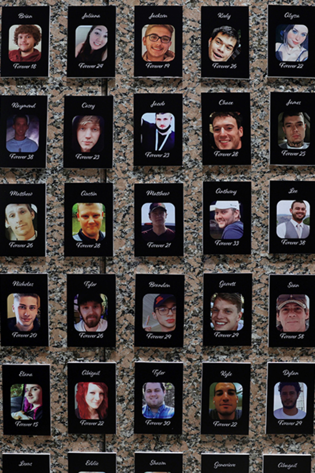 <p>Photos of fentanyl victims shown at the U.S. Drug Enforcement Administration headquarters. </p>
