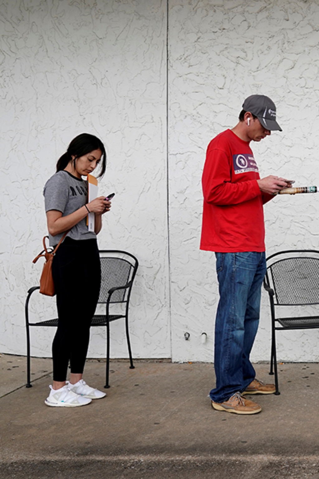 <p> People in Arkansas wait in line to file for unemployment after the COVID-19 outbreak.</p>
