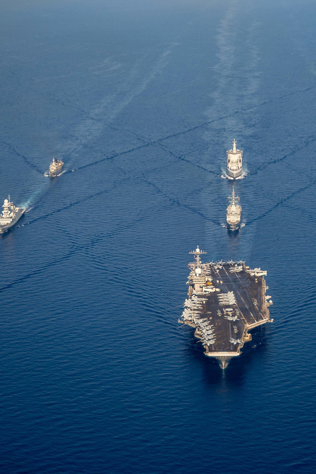 <p>Ships from Standing NATO Maritime Group 2 sail in formation in the Mediterranean Sea.</p>
