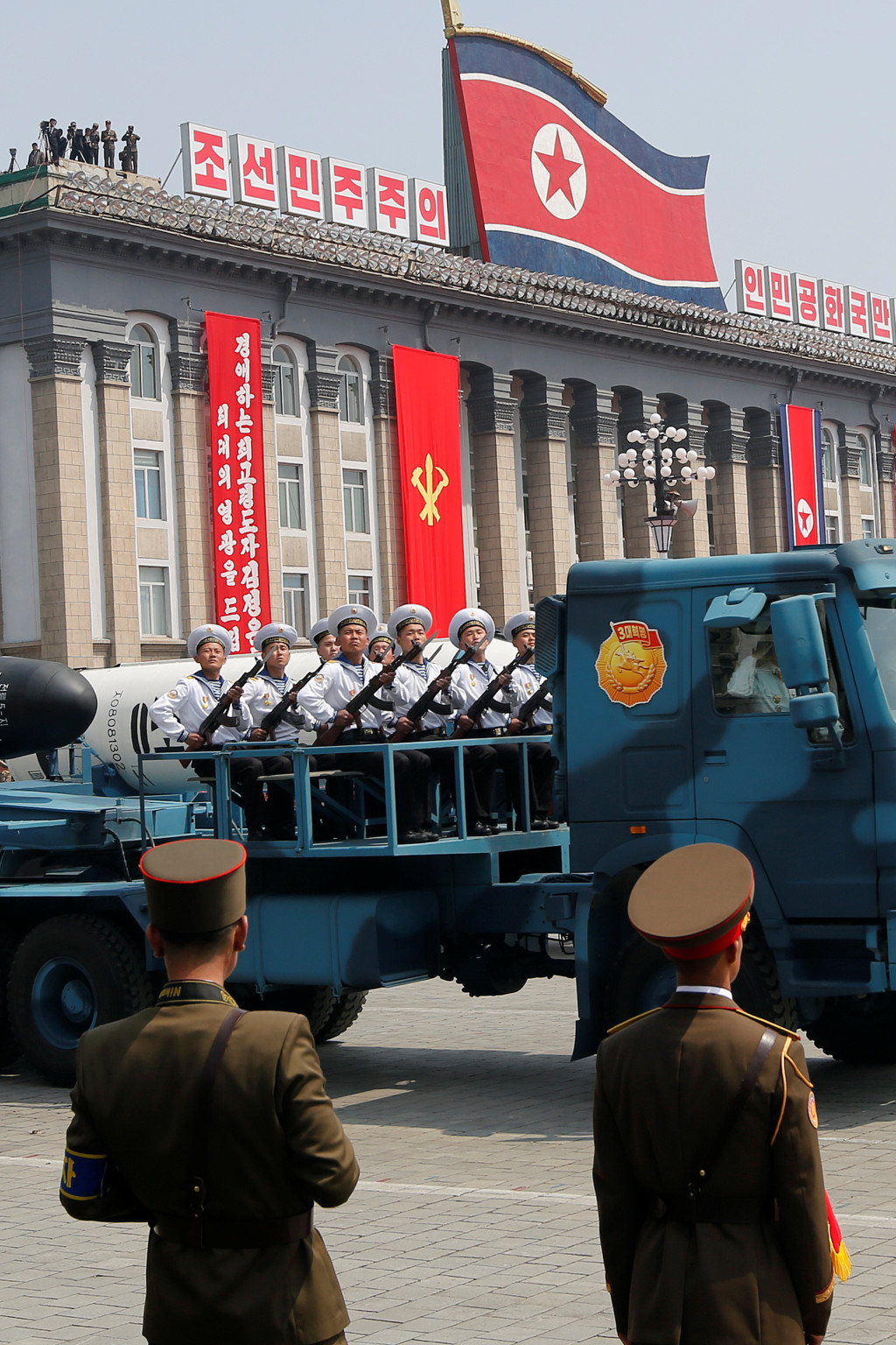 <p>Vehicles carry missiles during a military parade in Pyongyang.</p>
