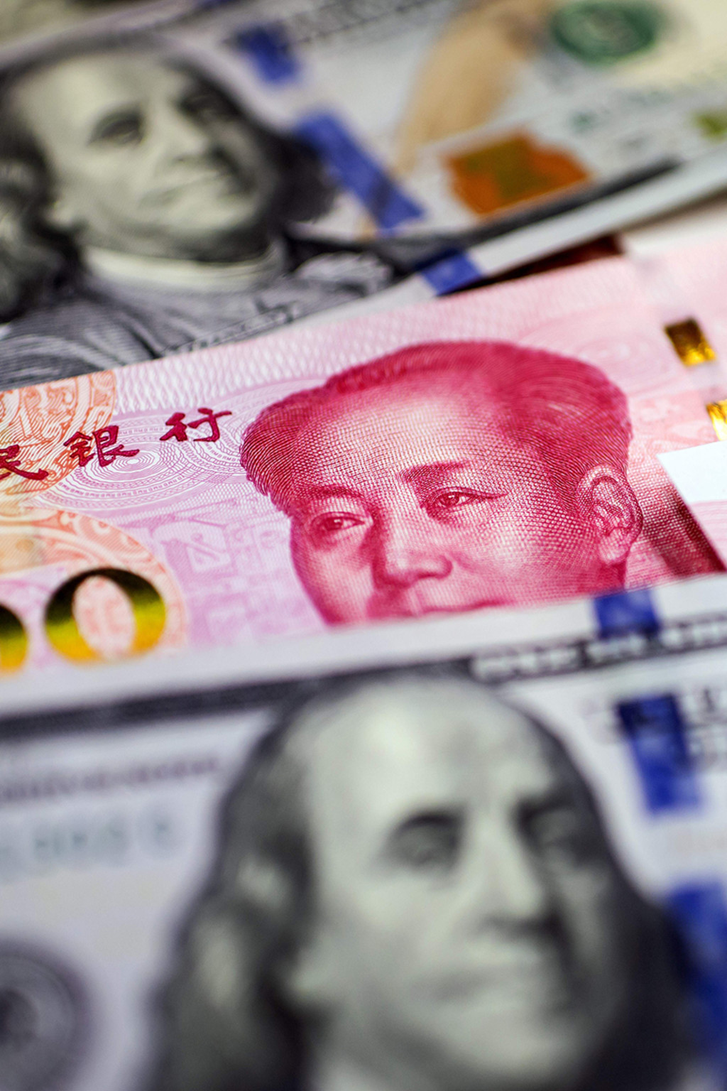 <p>U.S. and Chinese Banknotes.</p>
