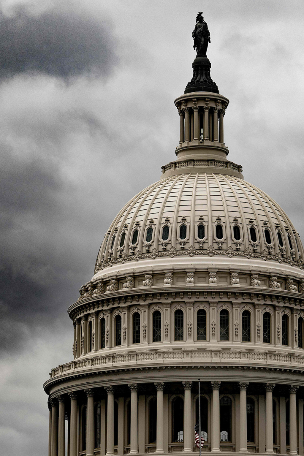 <p>Storm clouds hover above the U.S. Capitol.</p>