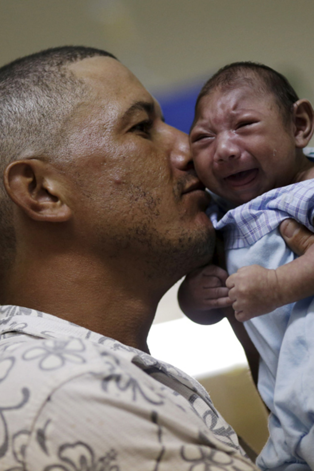<p>Geovane Silva holds his son Gustavo Henrique, who has microcephaly, at the Oswaldo Cruz Hospital in Recife, Brazil.</p>
