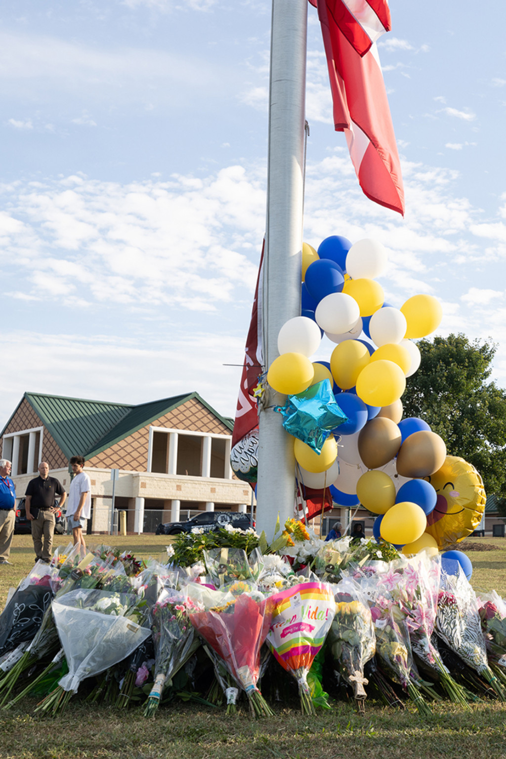<p>Students embrace near a makeshift memorial after a shooting at Apalachee High School in Georgia.</p>
