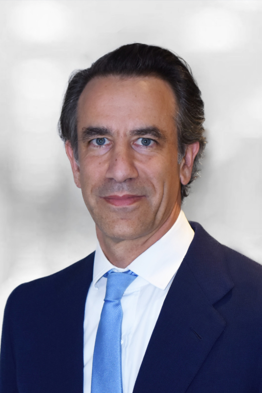 Justin Muzinich Headshot.jpg